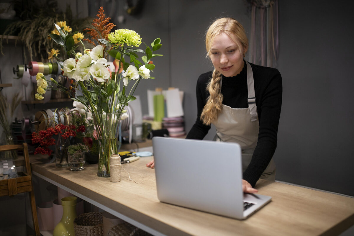 female-florist-using-laptop-work-1.jpg