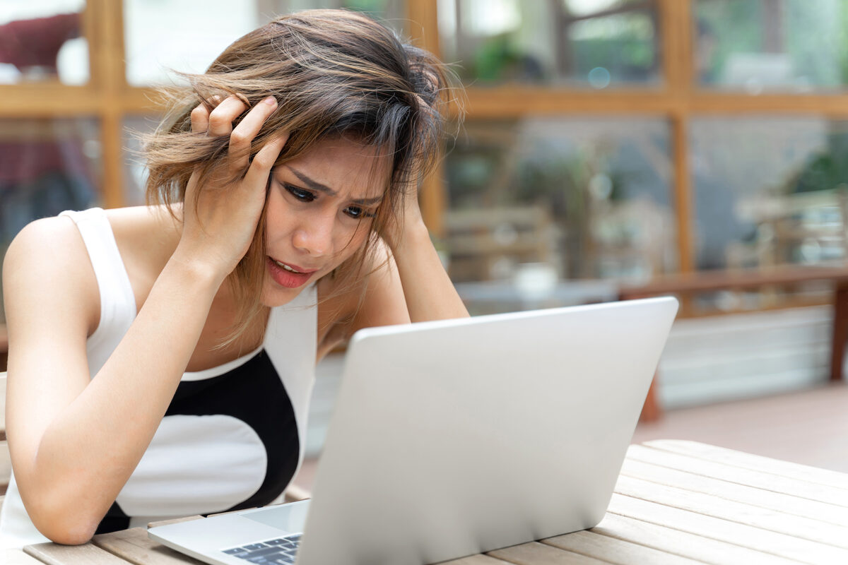 working-woman-feel-serious-looking-laptop-table.jpg